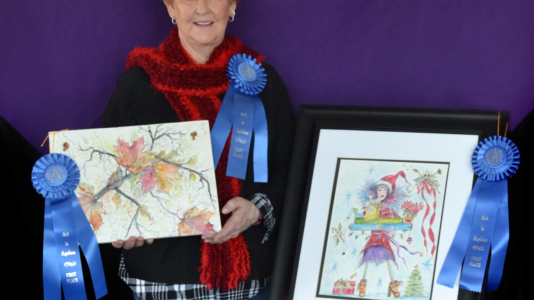 Joan Allen poses with her artwork, which won various categories in this year's Art is Ageless competition.