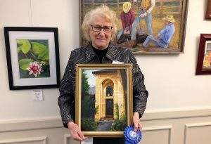 Charlotte Neese placed first in painting, professional, with her piece “Welcome.”