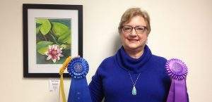 Susan Simmons’ first place amateur painting, “Water Lily on my Pond,” was also named Best in Show.