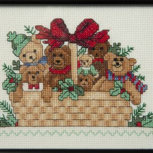 Needlework - Bears in a Basket - Needlework of seven bears in a woven basket accented with holly and red bow.