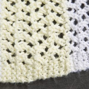 Needlework - Preemie Baby Blanket - Detail - baby blanket made from yellow, green and white yarn.