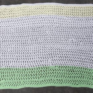 Needlework - Preemie Baby Blanket - image of small baby blanket made with yellow, white and green yarn.